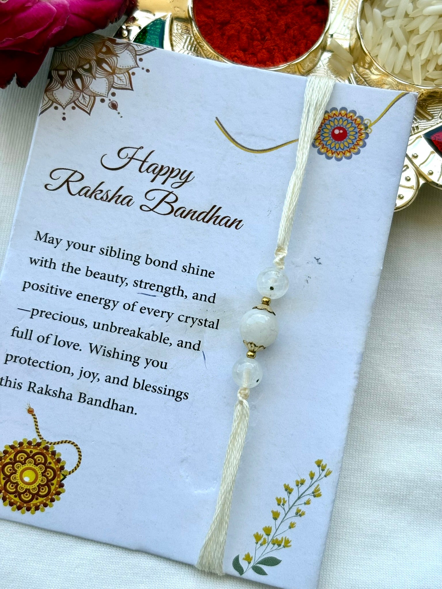 The Crystal Rakhi Ritual – 6 Threads, 6 Intentions