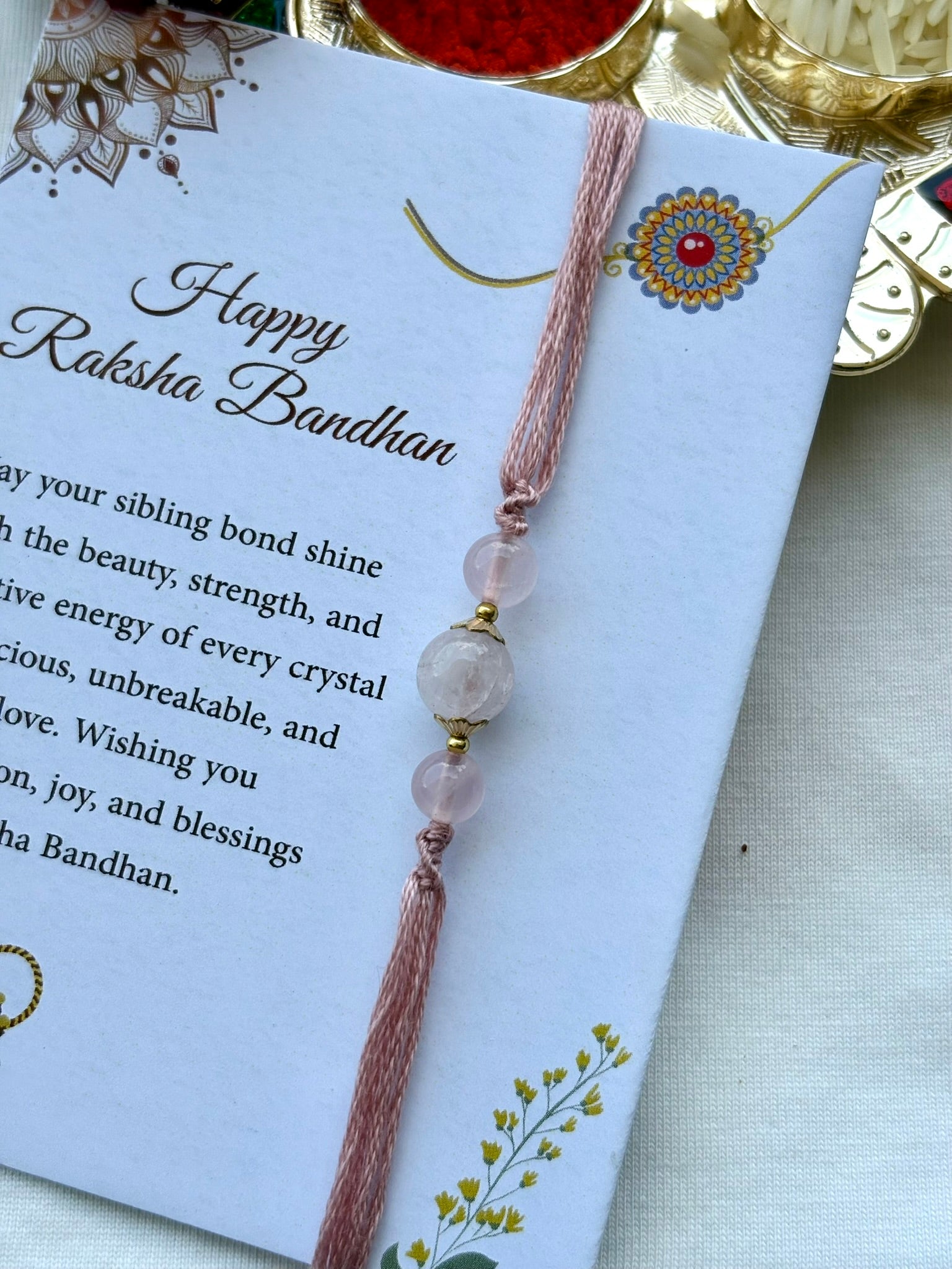 The Crystal Rakhi Ritual – 6 Threads, 6 Intentions