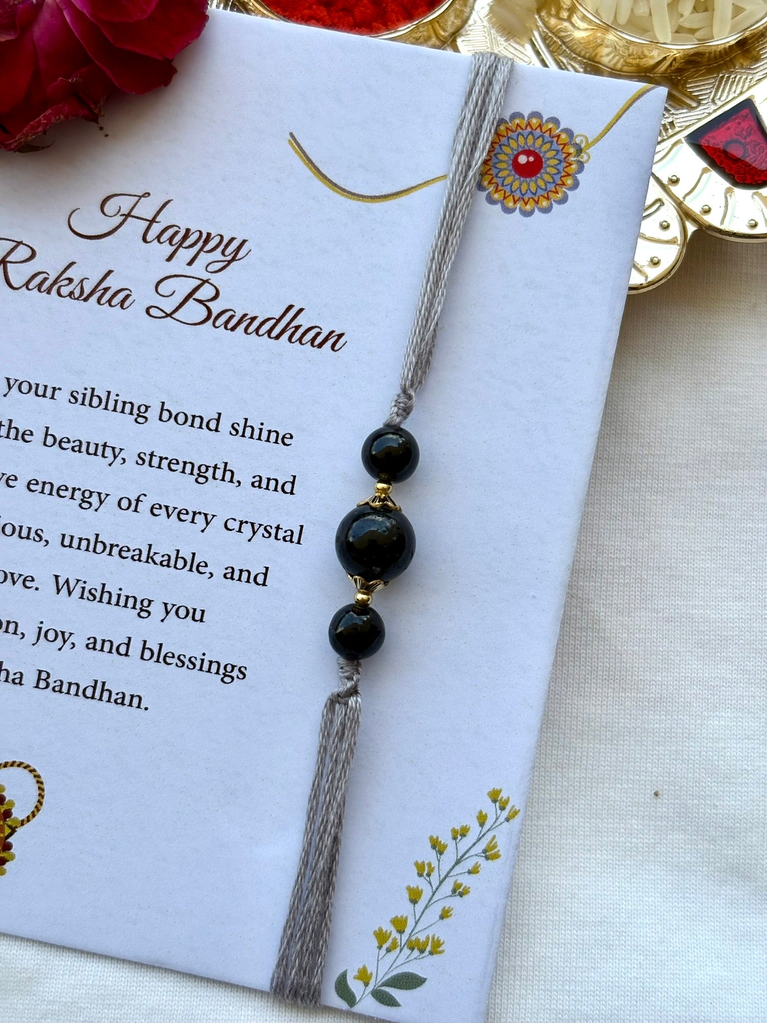The Crystal Rakhi Ritual – 6 Threads, 6 Intentions
