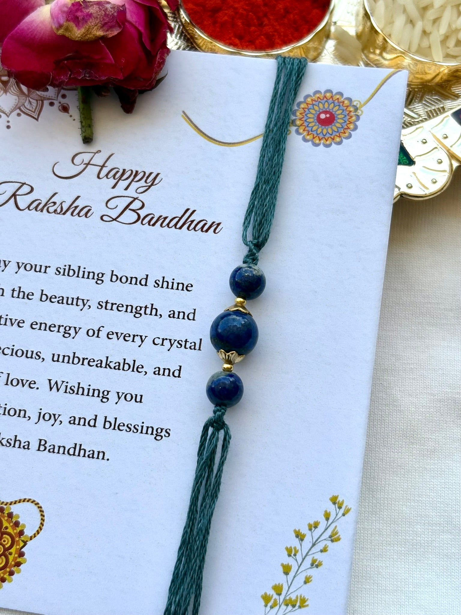 The Crystal Rakhi Ritual – 6 Threads, 6 Intentions